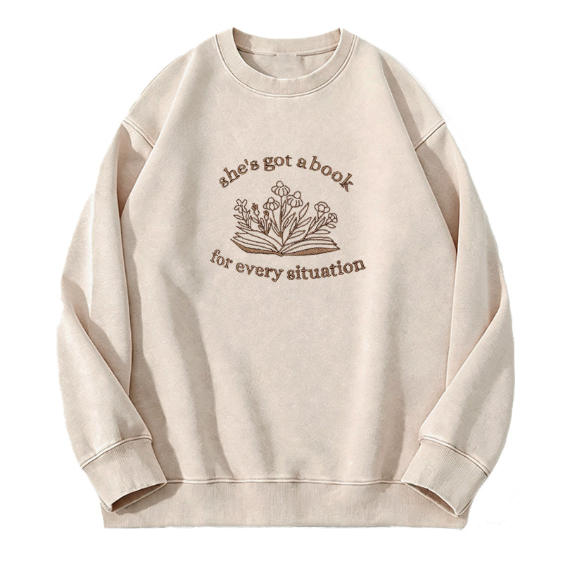 Embroidered She's Got A Book Washed Crewneck Sweatshirt