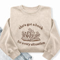 Embroidered She's Got A Book Washed Crewneck Sweatshirt