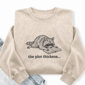 Embroidered The Plot Thickens Reading Raccoon Washed Crewneck Sweatshirt