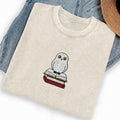 Embroidered Snow Owl On Bookstack Washed Crew Neck T-Shirt