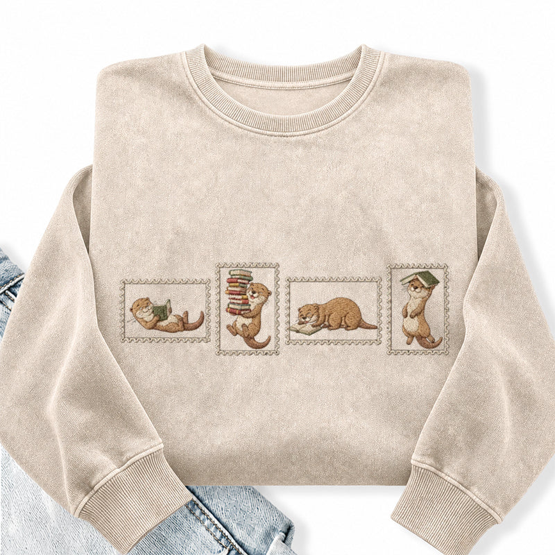 Embroidered Otter Reading Washed Crewneck Sweatshirt
