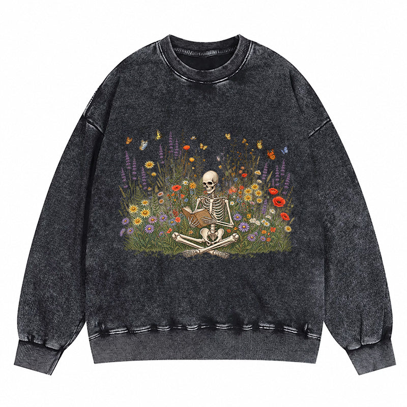 Skeleton Reading Book Wildflowers Washed Crewneck Sweatshirt