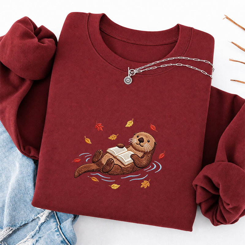 Embroidered Otter Reading Book Classic Crewneck Sweatshirt