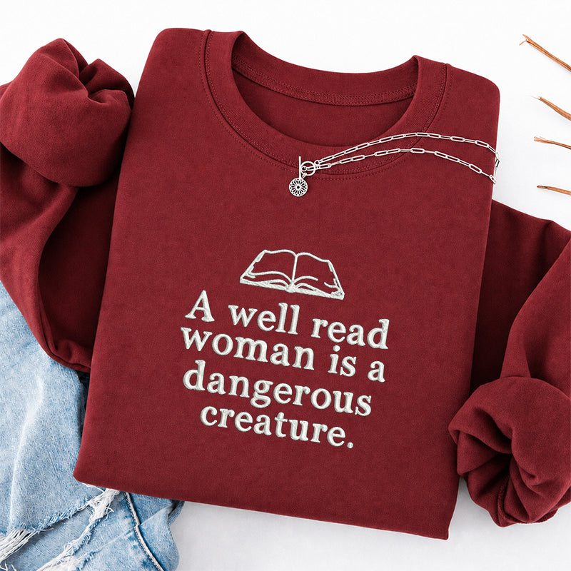 Embroidered A Well Read Woman Classic Crewneck Sweatshirt