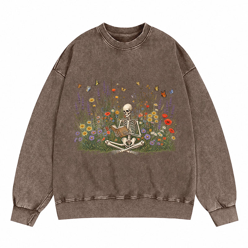 Skeleton Reading Book Wildflowers Washed Crewneck Sweatshirt