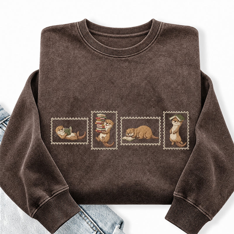 Embroidered Otter Reading Washed Crewneck Sweatshirt