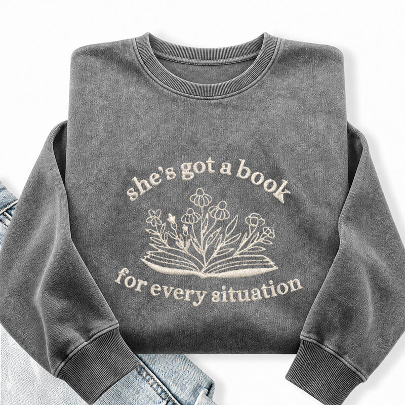 Embroidered She's Got A Book Washed Crewneck Sweatshirt