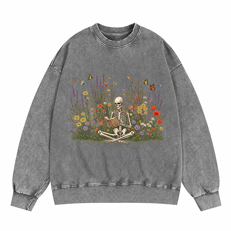 Skeleton Reading Book Wildflowers Washed Crewneck Sweatshirt