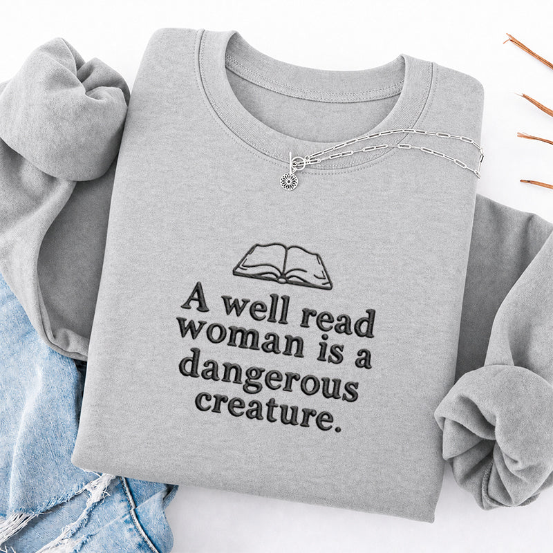 Embroidered A Well Read Woman Classic Crewneck Sweatshirt