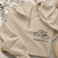 Embroidered The Plot Thickens Reading Raccoon Classic Quarter Zip Sweatshirt
